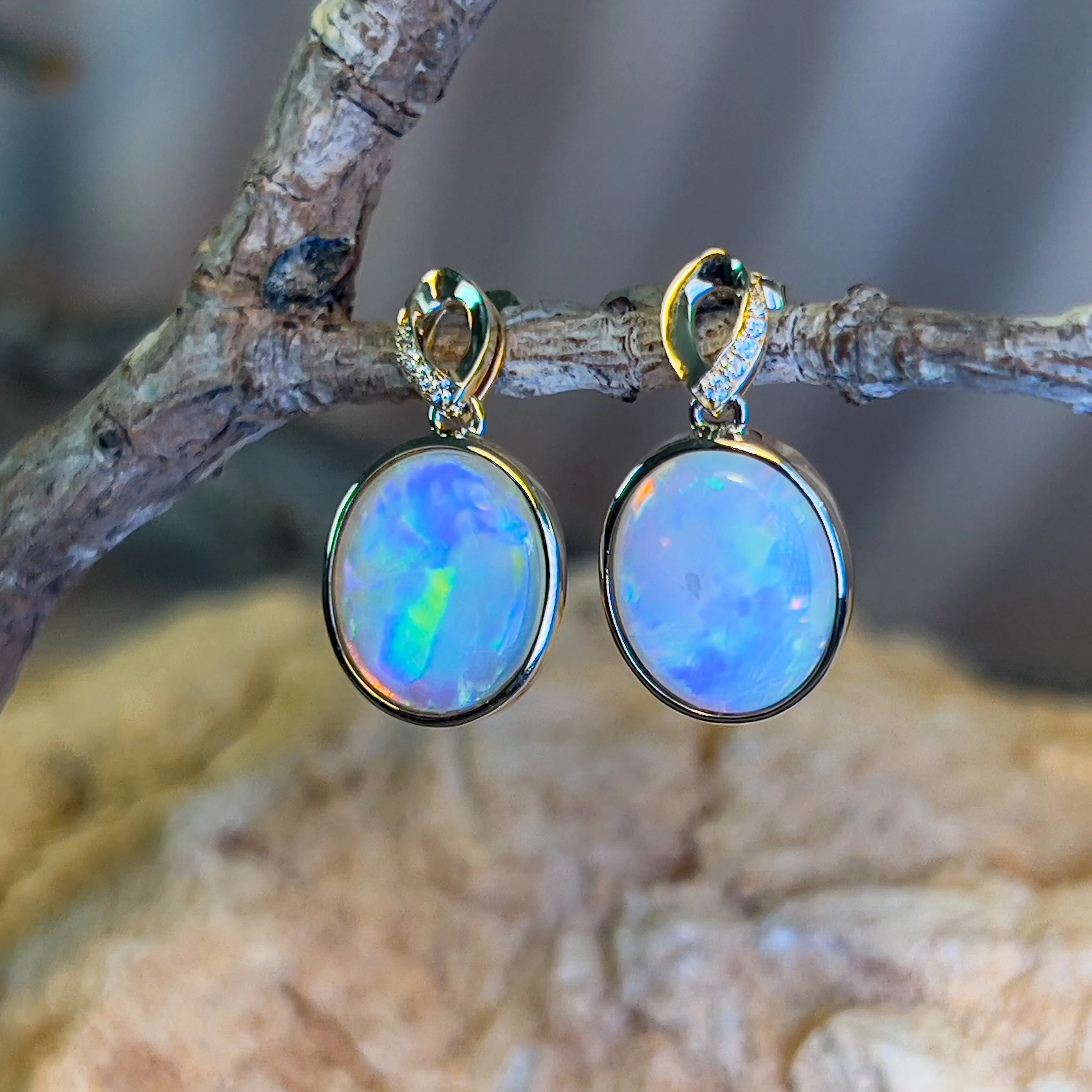 14kt Yellow Gold dangling Oval Opal earrings 5.1ct