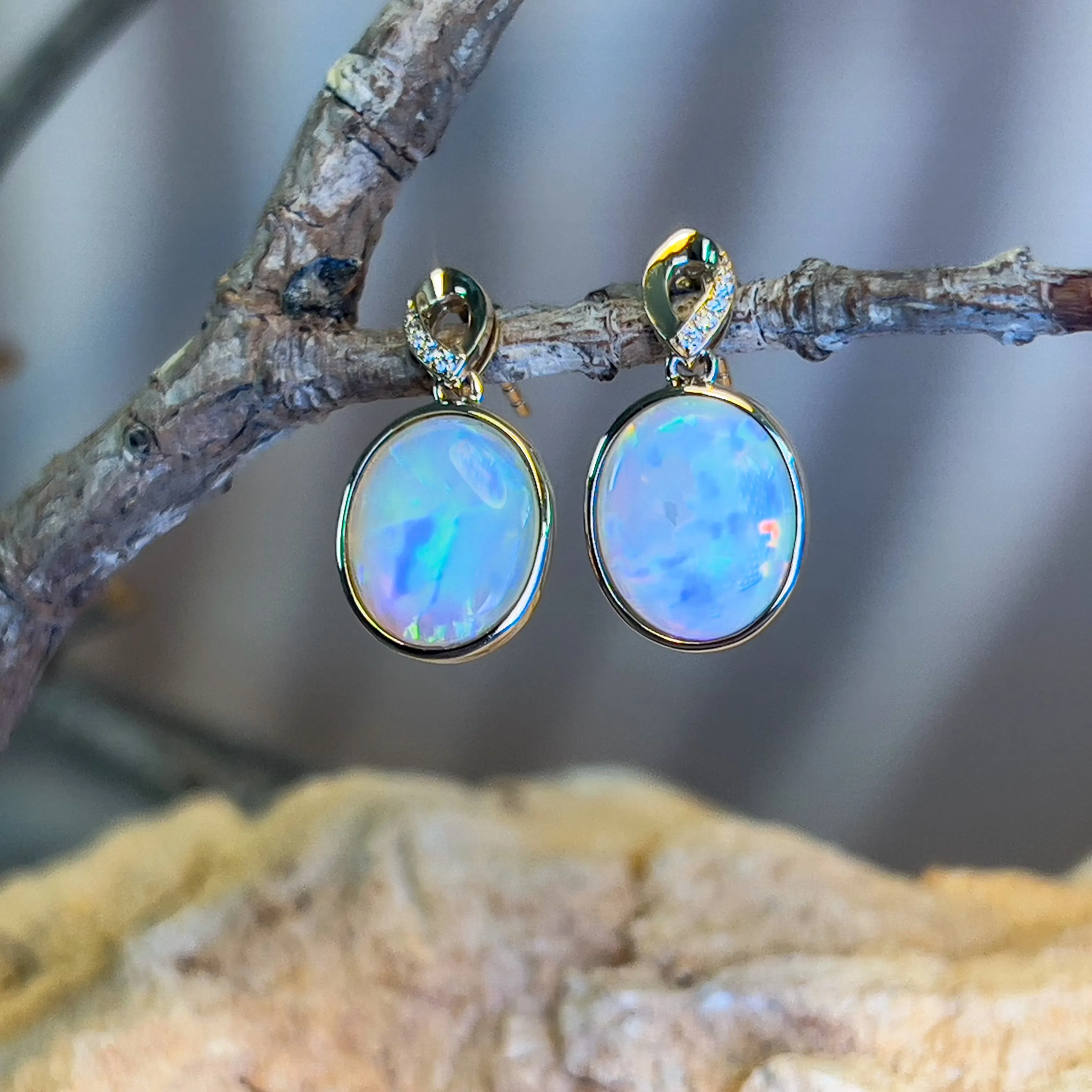 14kt Yellow Gold dangling Oval Opal earrings 5.1ct