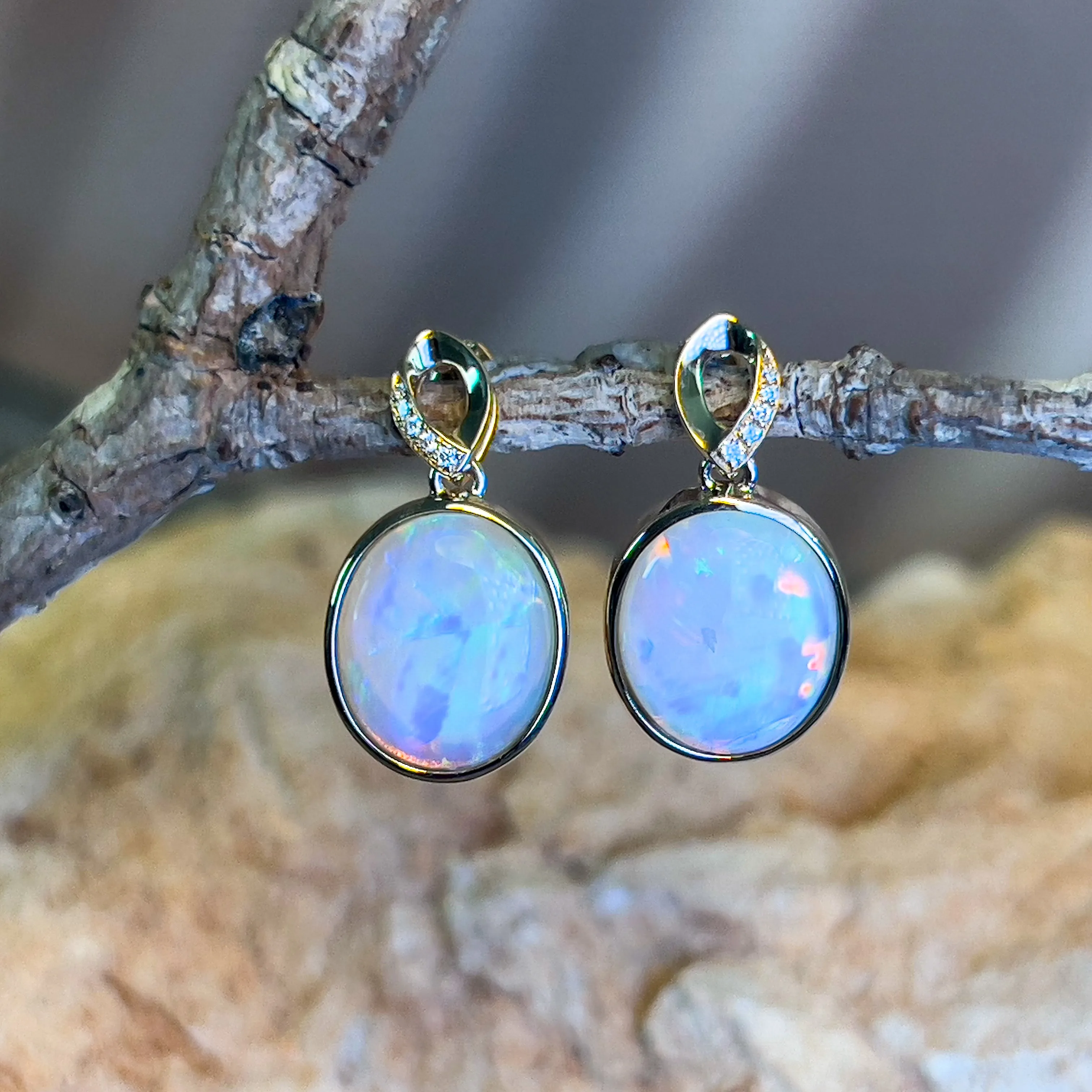 14kt Yellow Gold dangling Oval Opal earrings 5.1ct