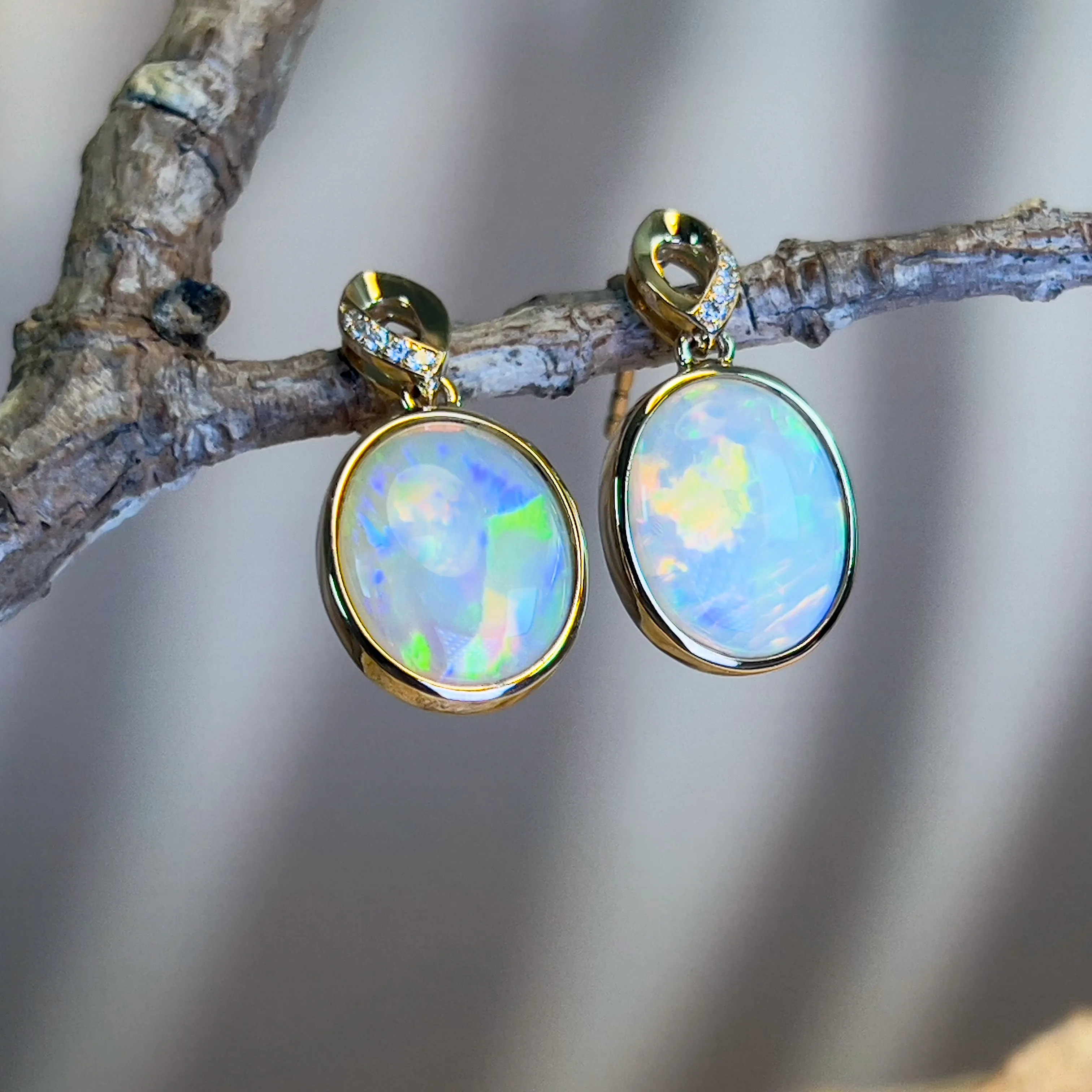 14kt Yellow Gold dangling Oval Opal earrings 5.1ct