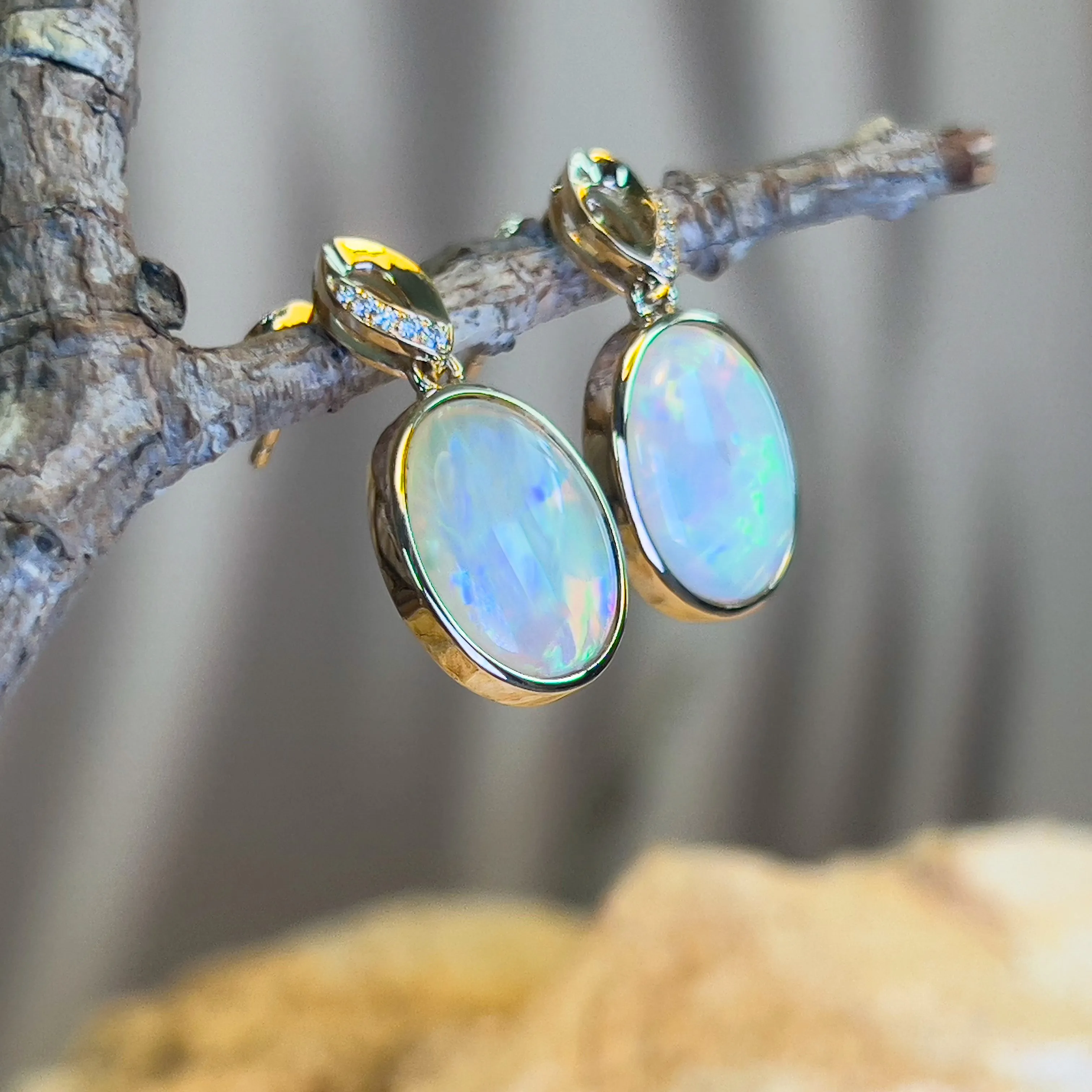 14kt Yellow Gold dangling Oval Opal earrings 5.1ct