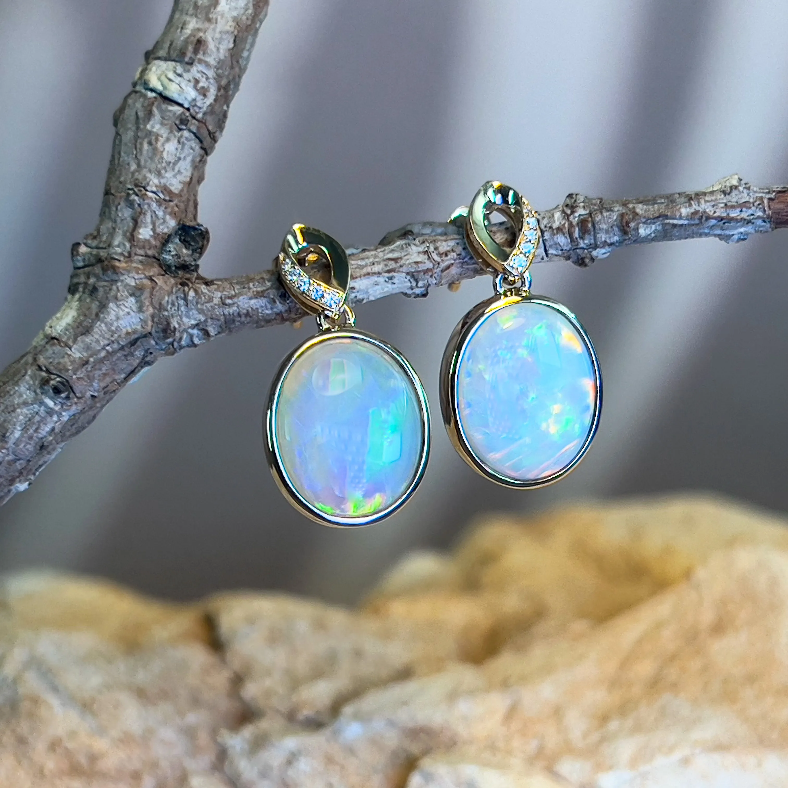 14kt Yellow Gold dangling Oval Opal earrings 5.1ct