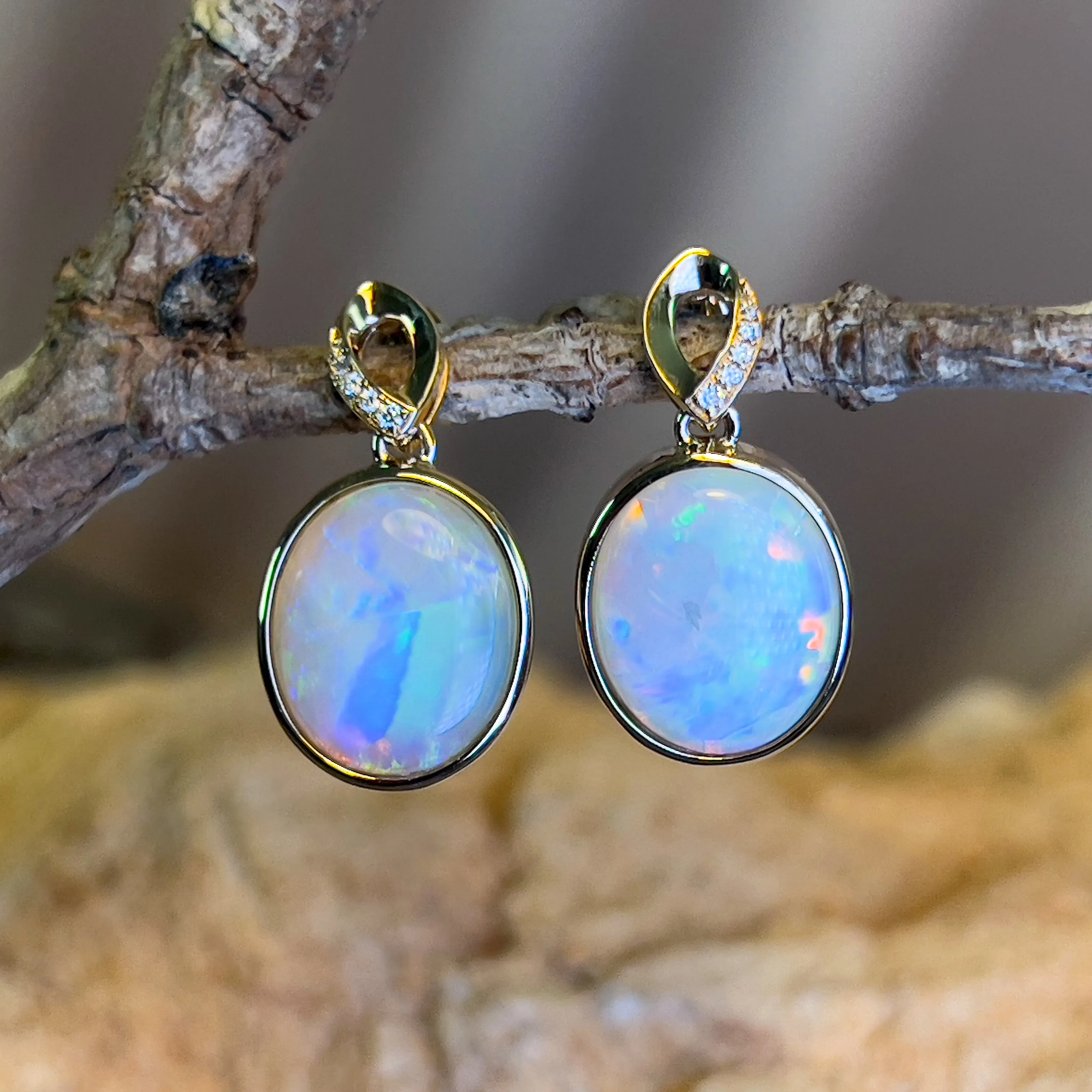 14kt Yellow Gold dangling Oval Opal earrings 5.1ct